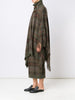 checked fringed poncho